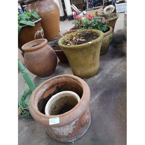 249B - Ten items, nine terracotta planters and one wooden plant stand - plant stand approx. 89.5cm high