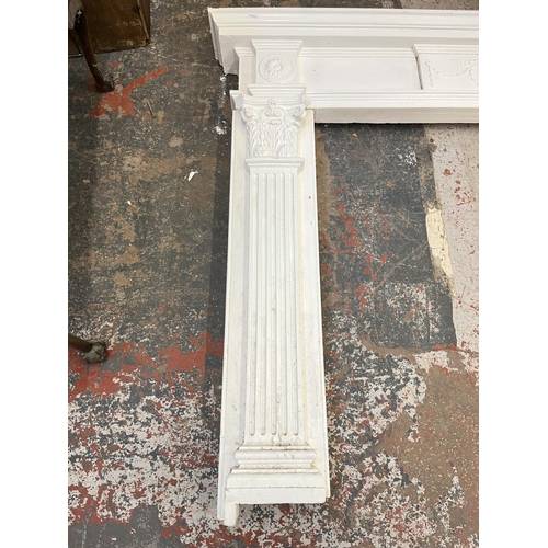 140 - A Georgian style plaster fire surround