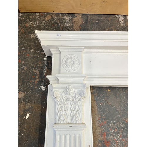 140 - A Georgian style plaster fire surround