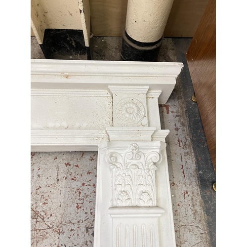 140 - A Georgian style plaster fire surround