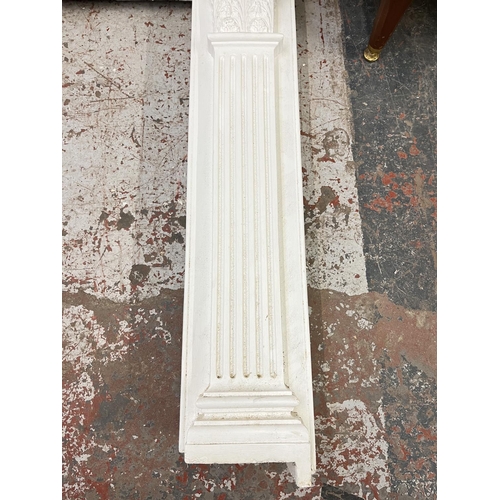 140 - A Georgian style plaster fire surround