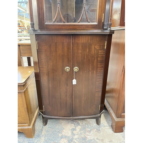 143 - A Strongbow Furniture Regency style mahogany freestanding corner cabinet