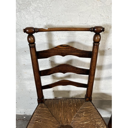 42 - Four 19th century oak and rush seated Lancashire chairs