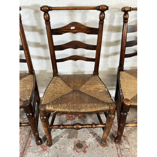 42 - Four 19th century oak and rush seated Lancashire chairs