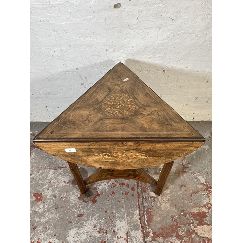 84 - A 19th century inlaid rosewood trifold two tier occasional table - approx. 57cm high x 70cm diameter