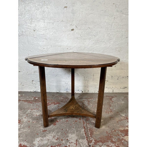 84 - A 19th century inlaid rosewood trifold two tier occasional table - approx. 57cm high x 70cm diameter