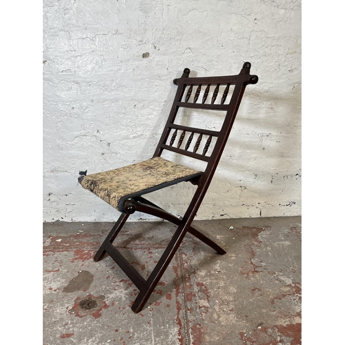 85 - A Boer War oak and tapestry folding chair made by P.E. Kruger K. G. St Helena 1901, believed to be p... 