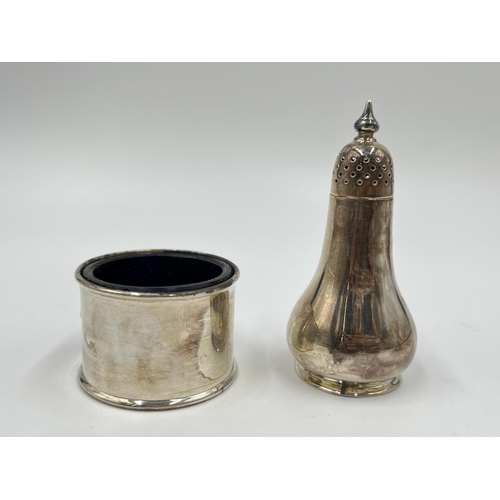 1252 - Two pieces of Atkin Brothers hallmarked Sheffield silver, one condiment pot with blue glass liner an... 