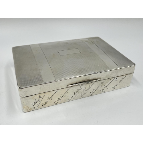 1254 - A William Neale & Son hallmarked Birmingham silver presentation cigarette box, dated 1927 - approx. ... 