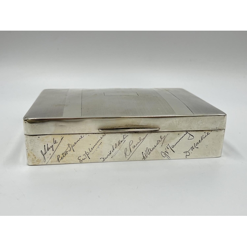 1254 - A William Neale & Son hallmarked Birmingham silver presentation cigarette box, dated 1927 - approx. ... 