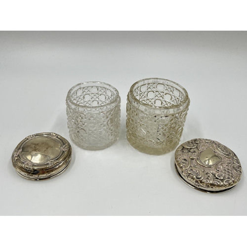 1257 - Seven ceramic and glass bottles and pots with hallmarked sterling silver tops - approx. gross silver... 