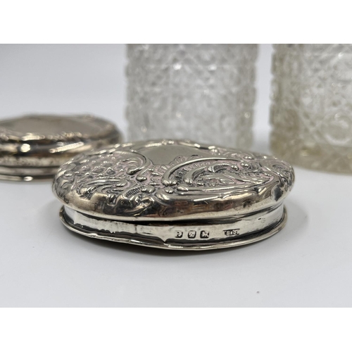 1257 - Seven ceramic and glass bottles and pots with hallmarked sterling silver tops - approx. gross silver... 