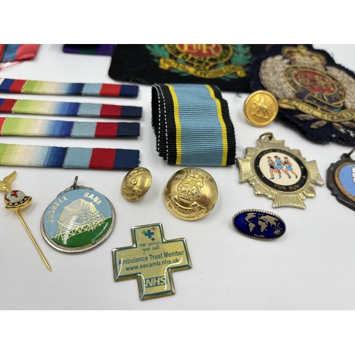 A collection of buttons, badges, ribbons and medals to include Royal ...
