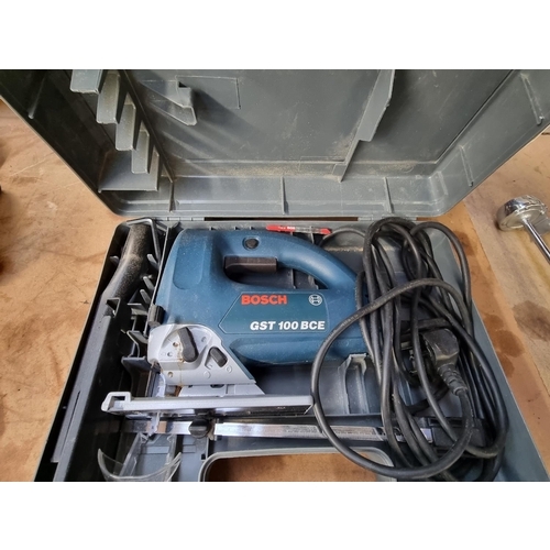 206 - Two cased Bosch 240v handheld power tools, GST100BCE jig saw and GBS75AE sander with instruction man... 