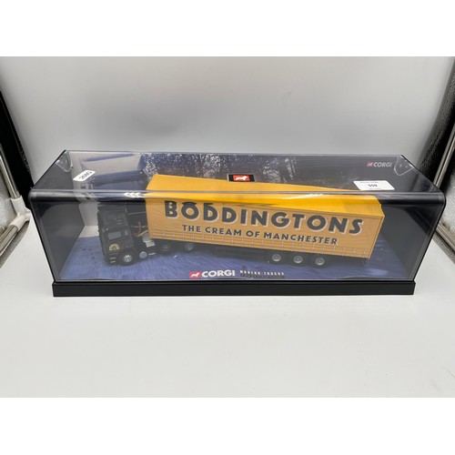 559 - Two Corgi Modern Trucks die-cast model vehicles, one Boddingtons and one Heineken