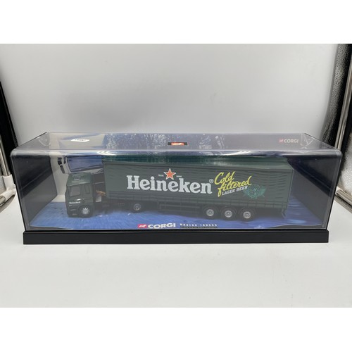 559 - Two Corgi Modern Trucks die-cast model vehicles, one Boddingtons and one Heineken