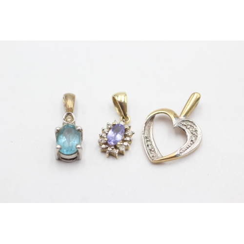 1012 - Three 9ct gold diamond pendants, one topaz, one tanzanite and one heart shaped - approx. gross weigh... 