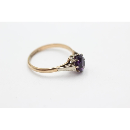 1019 - A 9ct gold amethyst cathedral setting dress ring, size O½ - approx. gross weight 1.8 grams