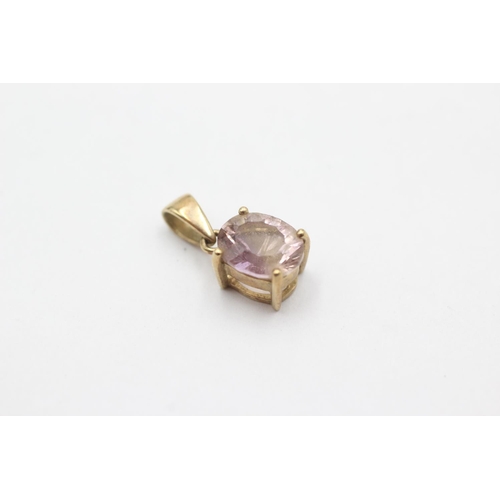 1022 - A 9ct gold amethyst solitaire pendant - approx. gross weight 1.5 grams