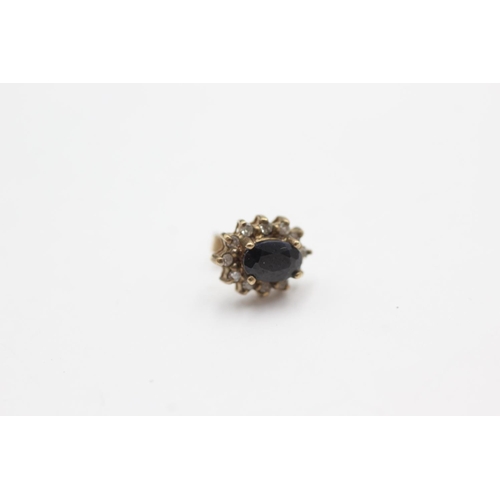 1025 - A pair of 9ct gold sapphire and diamond cluster stud earrings - approx. gross weight 1.5 grams