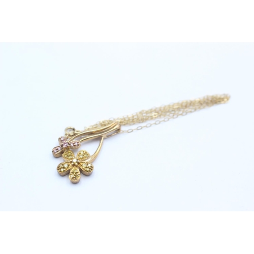 1027 - A 9ct gold yellow and pink diamond floral pendant necklace - approx. gross weight 2.8 grams