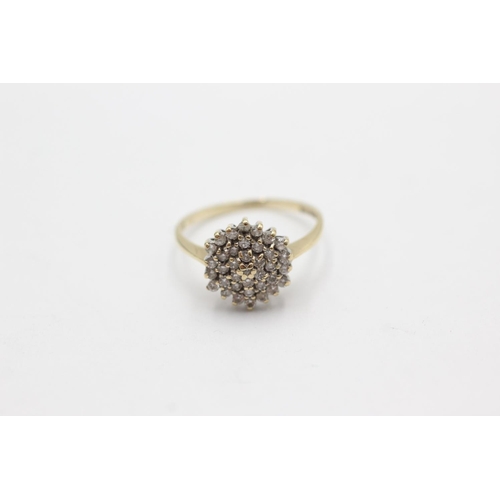 1029 - A 9ct gold diamond cluster ring, size N½ - approx. gross weight 2 grams