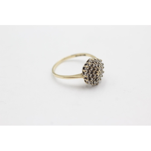 1029 - A 9ct gold diamond cluster ring, size N½ - approx. gross weight 2 grams