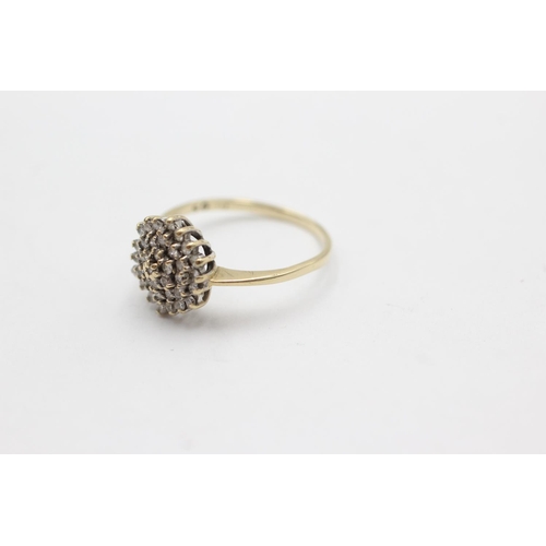 1029 - A 9ct gold diamond cluster ring, size N½ - approx. gross weight 2 grams