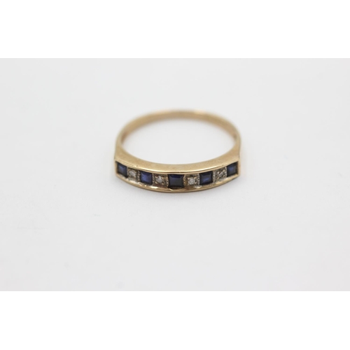 1033 - A 9ct gold sapphire and diamond channel setting ring, size O - approx. gross weight 1.7 grams