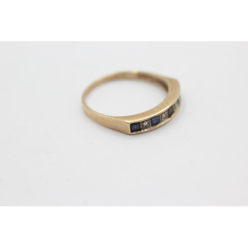 1033 - A 9ct gold sapphire and diamond channel setting ring, size O - approx. gross weight 1.7 grams