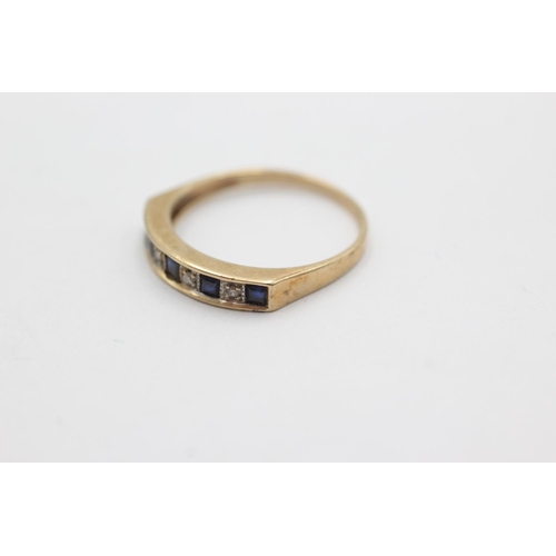 1033 - A 9ct gold sapphire and diamond channel setting ring, size O - approx. gross weight 1.7 grams