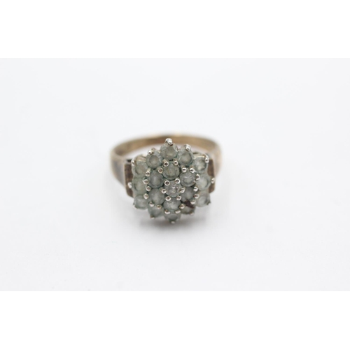 1035 - A 9ct gold clear gemstone starburst cluster ring, size M - approx. gross weight 3.8 grams