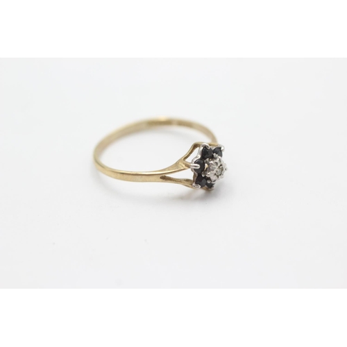 1036 - A 9ct gold diamond and sapphire split shoulders ring, size N½ - approx. gross weight 1.1 grams