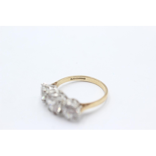 1037 - A 9ct gold clear gemstone trilogy statement ring, size N - approx. gross weight 3.4 grams