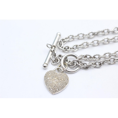 1040 - A 9ct white gold diamond set heart T-bar necklace - approx. gross weight 7.3 grams