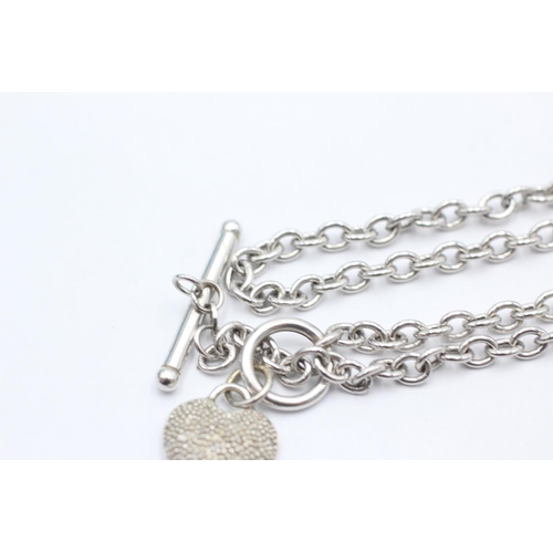 1040 - A 9ct white gold diamond set heart T-bar necklace - approx. gross weight 7.3 grams