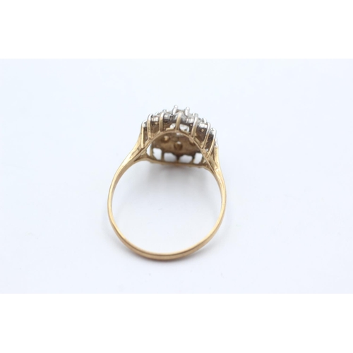 1042 - A 9ct gold clear gemstone double halo statement ring, size T - approx. gross weight 3.6 grams