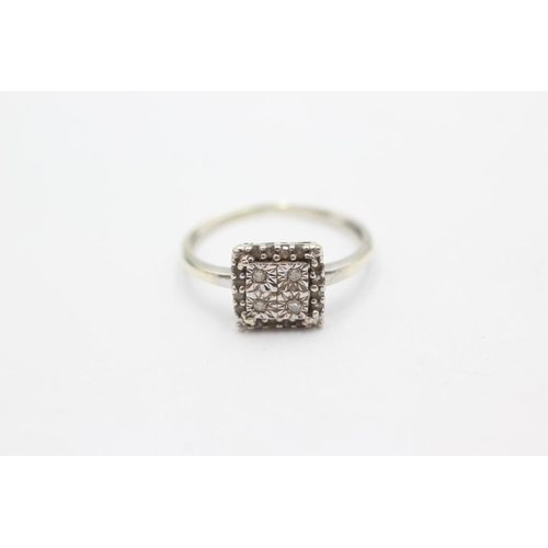 1051 - A 9ct white gold diamond dress ring, size L - approx. gross weight 1.4 grams