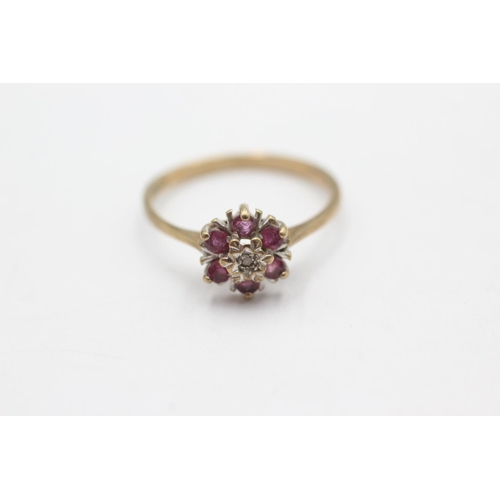 1052 - A 9ct gold ruby and diamond cluster ring, size P½ - approx. gross weight 1.8 grams