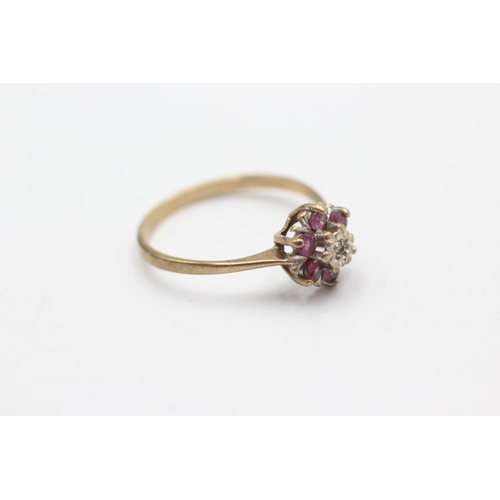 1052 - A 9ct gold ruby and diamond cluster ring, size P½ - approx. gross weight 1.8 grams