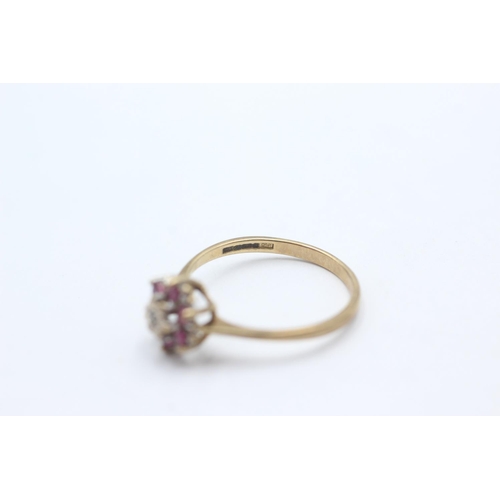 1052 - A 9ct gold ruby and diamond cluster ring, size P½ - approx. gross weight 1.8 grams