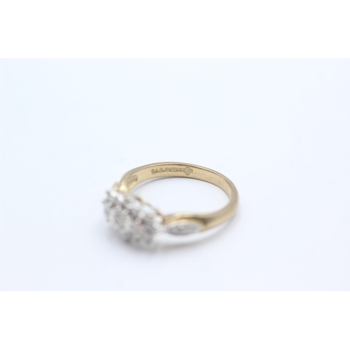 1059 - A 9ct gold diamond cluster ring, size N½ - approx. gross weight 2.5 grams