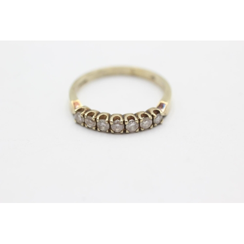 1064 - A 9ct gold diamond half-eternity ring, size P - approx. gross weight 2.3 grams