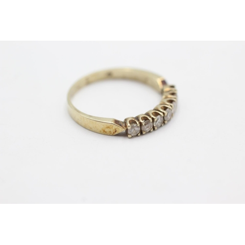 1064 - A 9ct gold diamond half-eternity ring, size P - approx. gross weight 2.3 grams