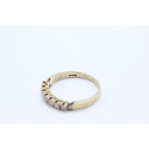 1064 - A 9ct gold diamond half-eternity ring, size P - approx. gross weight 2.3 grams