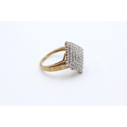 1065 - A 9ct gold diamond cluster statement ring, size P - approx. gross weight 3.6 grams