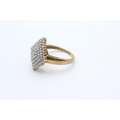 1065 - A 9ct gold diamond cluster statement ring, size P - approx. gross weight 3.6 grams