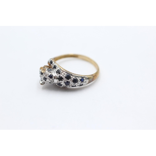 1069 - A 9ct gold diamond and sapphire set panther ring, size P½ - approx. gross weight 2.8 grams