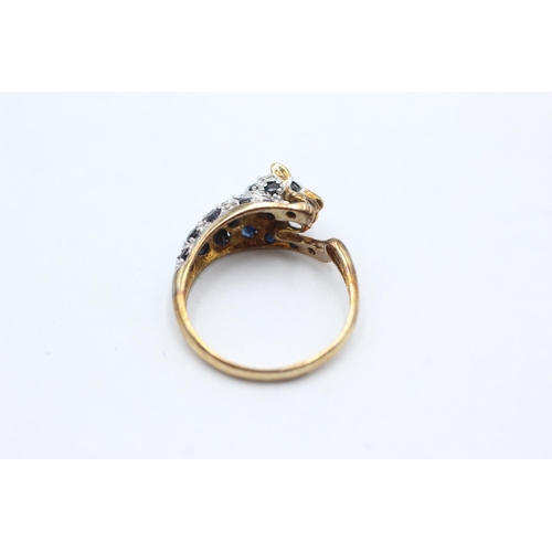 1069 - A 9ct gold diamond and sapphire set panther ring, size P½ - approx. gross weight 2.8 grams