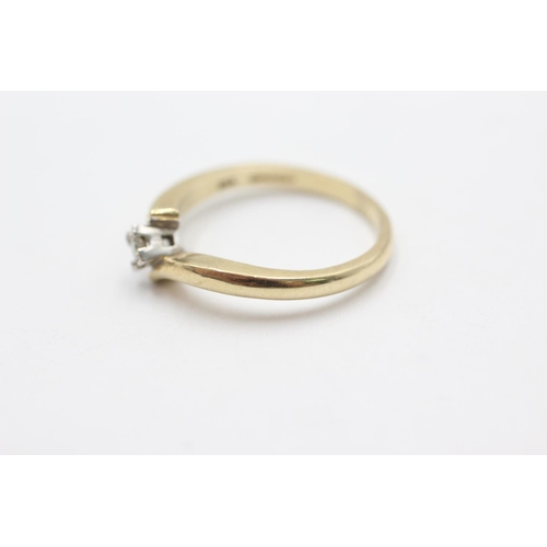 1075 - A 9ct gold diamond solitaire twist setting ring, size P - approx. gross weight 2.8 grams